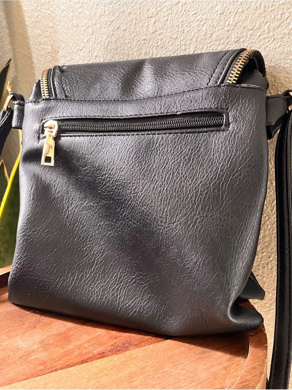 Black Tassel Hobo Crossbody Bag with Gold Accents